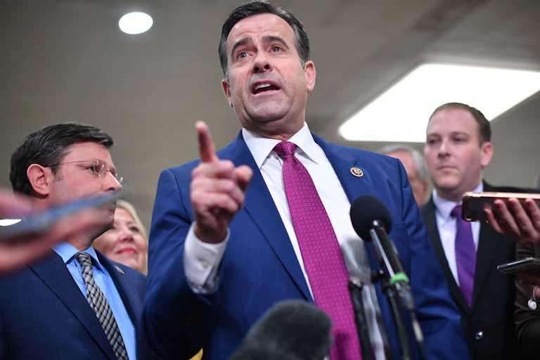 John Ratcliffe speaks to reporters in the Capitol